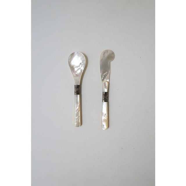 A beautiful Mother of Pearl caviar spoon and knife spreader set (2 pieces.) A great set for caviar or other gourmet...