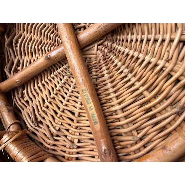 Vintage wicker bar stools with a classic "lobster pot" design popularized by designers like Franco Albini in the 18950's...