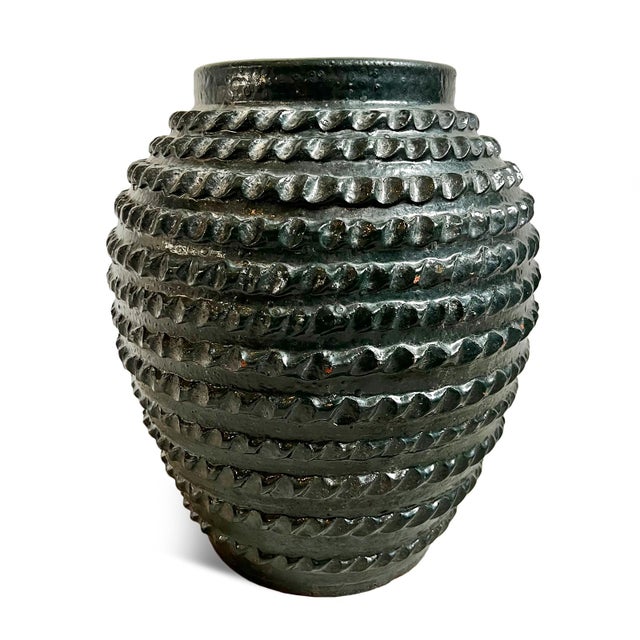 Antique Indonesian ceramic vase. Beautiful rich spruce green glaze with thumbprint band design. Each is sold individually.