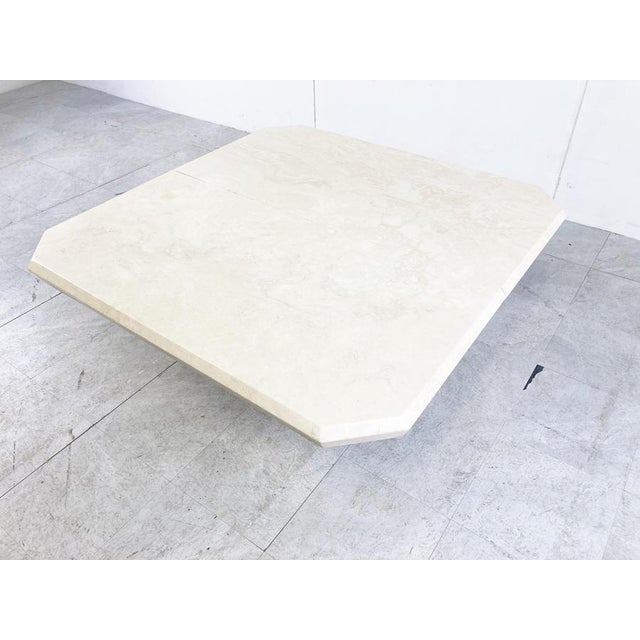 Vintage travertine hidden bar coffee table. The two table tops slide open to reveal a storage space. Elegant shaped base...