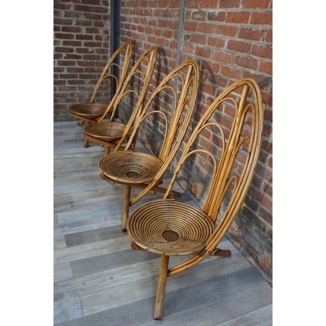 This set of four lounge chairs (seat height 33cm / diameter 50cm) in rattan and wood is strikingly stylish. Dreaming of a...