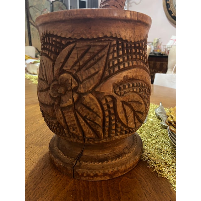 Up for consideration is a beautiful vintage hand carved detailed wooden mortar and pestle. This would look lovely in your...