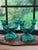 A striking pair of authentic 1930s Depression glass two-light candlestick holders by the Jeannette Glass Company in the...