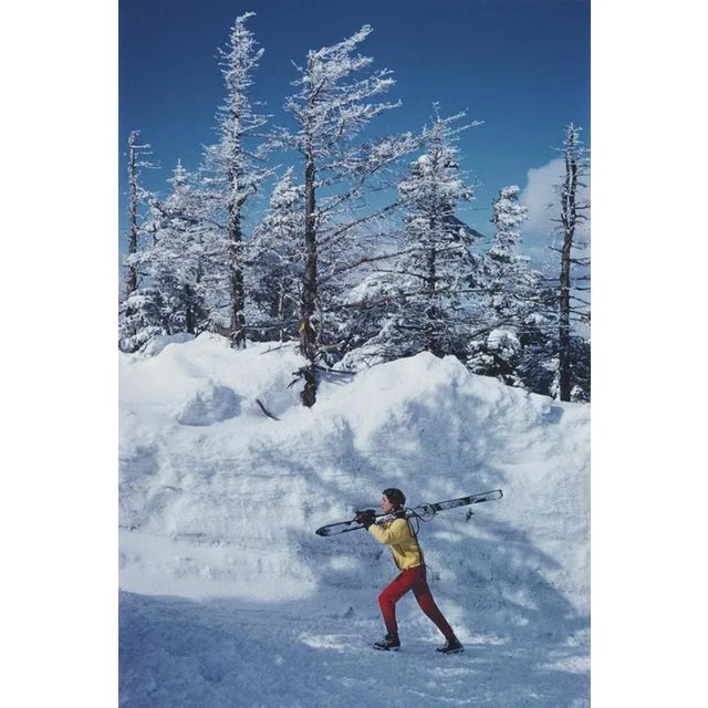 A skier in vermont 1962 by slim aarons slim aarons limited estate edition a skier at the stowe mountain resort, vermont,...