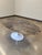 Gorgeous oval Tulip Table by Eero Saarinen for Knoll. The 84” table is topped in satin-coated Espresso marble and sits...