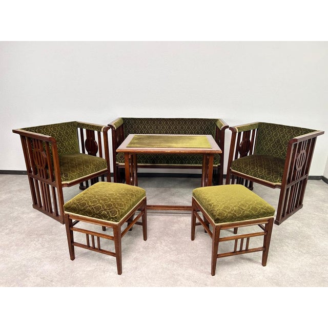 Very rare Vienna secession seating group in very nice original condition. Dimensions: Sofa 127x57x80cm Table 80x55x75cm 2x...