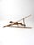 Late 19th-century horse-drawn walking cultivator with a wood frame, long flared handles, iron hardware, and broad...