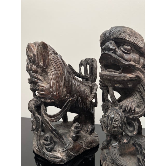 Mid 20th Century Pair of Intricately Carved Wooden Foo Dogs For Sale - Image 9 of 14