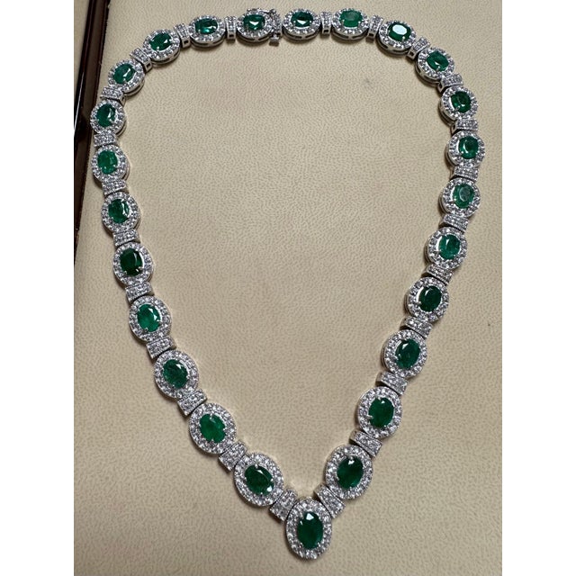 28 Carat Oval Shape Natural Emerald & 5 Carat Diamond Necklace in 14 Karat Gold This spectacular Bridal Necklace...