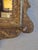 Impressive 18th century English wall mirror handcrafted in hardwood with a broken sediment and floral carvings throughout,...