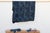 A masterwork of Malian textile heritage featuring deep indigo saturation and symbolic geometric motifs. Originating from...