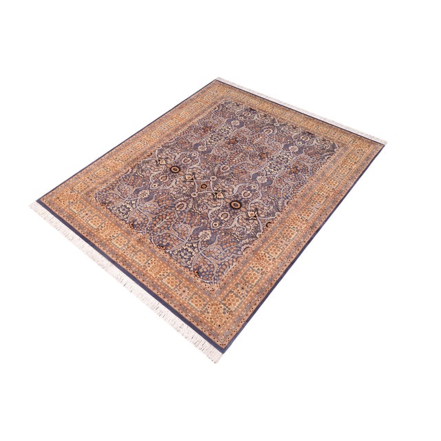Designed with mesmerizing intricacy and gorgeous color palette, this hand-knotted masterpiece demonstrates the beauty and...