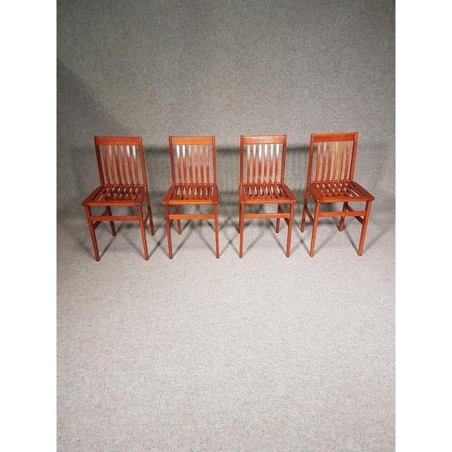 Set of 8 cherry wood chairs, designed in 1985 by Aldo Rossi for Molteni In a very good condition H83 w37 d 40 zh 47