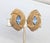1950s goldtone ribbed pointed oval shape with single marquise faux-aquamarine clip earrings. Marked "NAPIER PAT. PEND."...