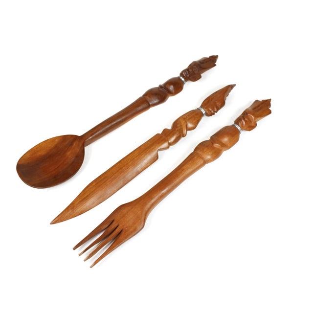 Item Details: -This set of fork, knife and spoon are hand carved of natural solid wood with unique figurative carved...