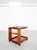 Elegant, C-shaped tea trolley/bar cart made of high-quality teak in a Scandinavian mid-century modern style. This piece of...
