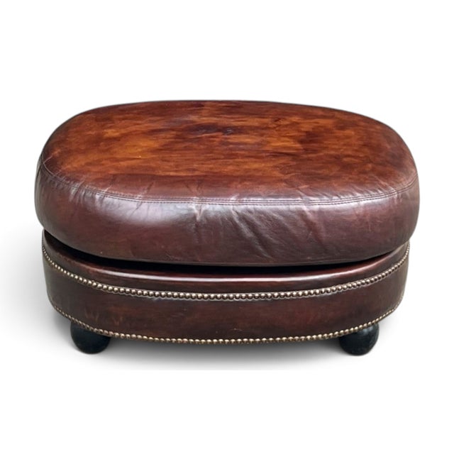 English Vintage Oval Brown Leather Ottoman With Brass Nailhead Trim and Rounded Feet For Sale - Image 3 of 10
