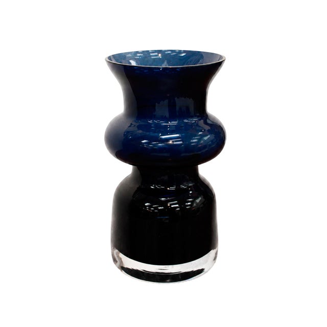 Italian Murano glass vase dating from the 1970s, featuring a sculptural silhouette with rounded volumes, a flared upper...