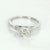 Art Deco era engagement ring (circa 1920s to 1930s), crafted in 18 karat white gold. Centrally mounted estimated 0.85...