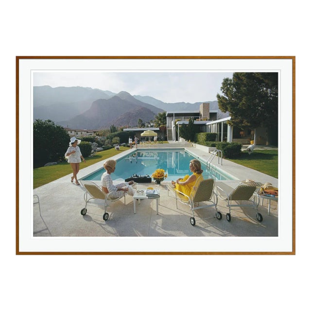 Catch Up by the Pool 1970 by Slim Aarons Framed C-Print For Sale