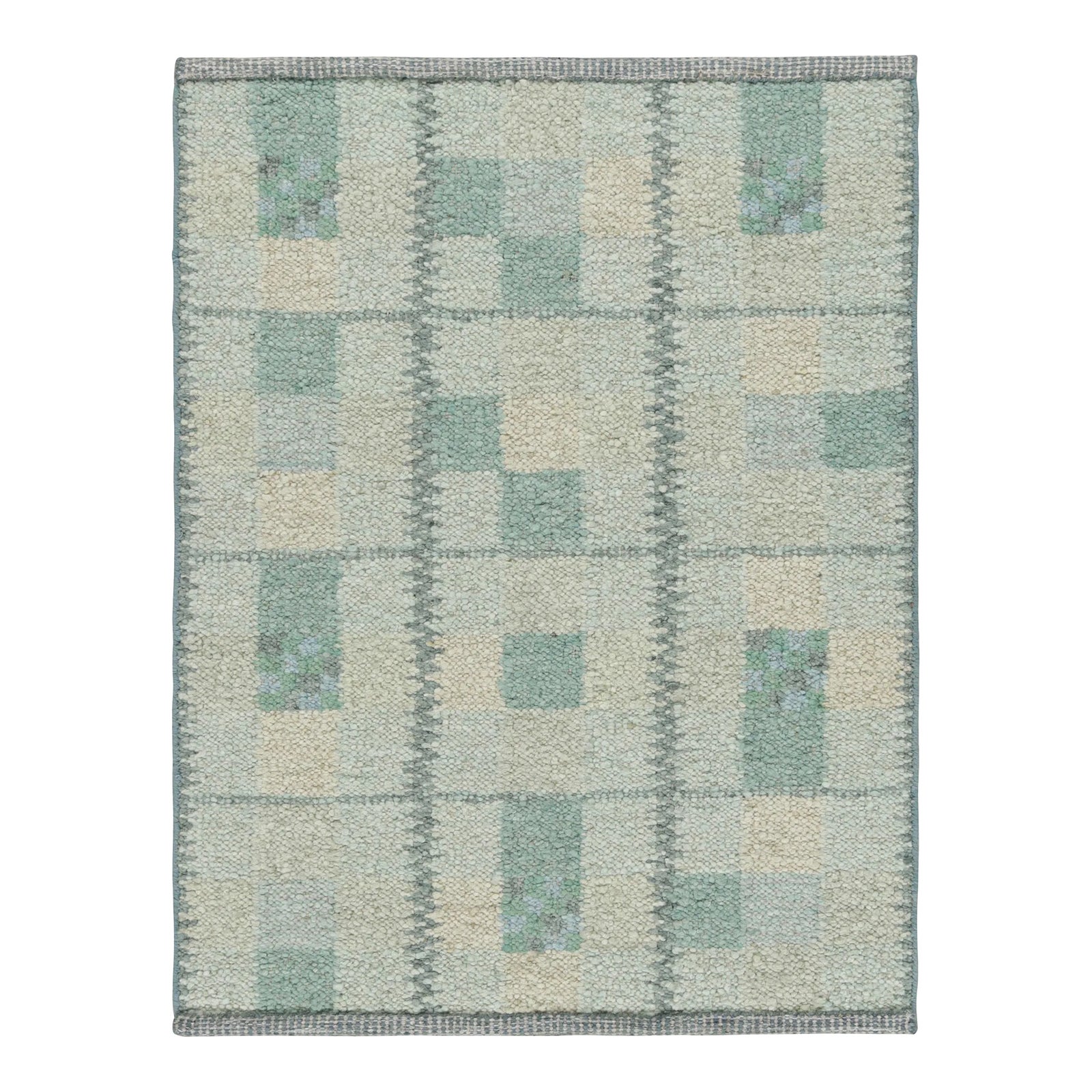 Rug & Kilim’s Scandinavian Rug in Seafoam Green and Teal Blue Geometric