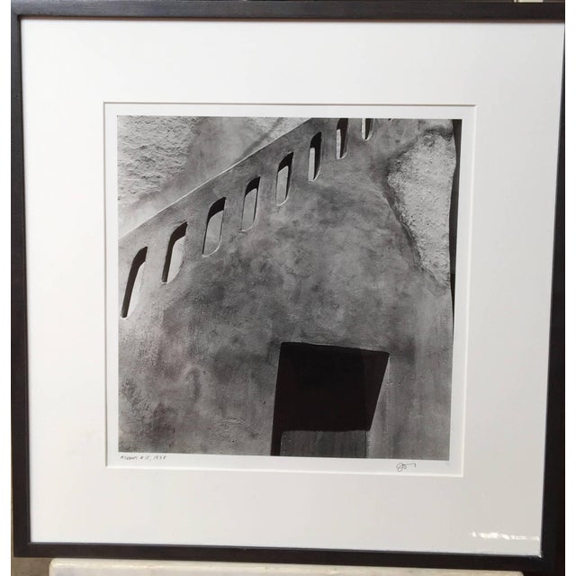 Framed black and white silver gelatin print, Mykonos #15 by photographer Jed Fielding. An internationally recognized...