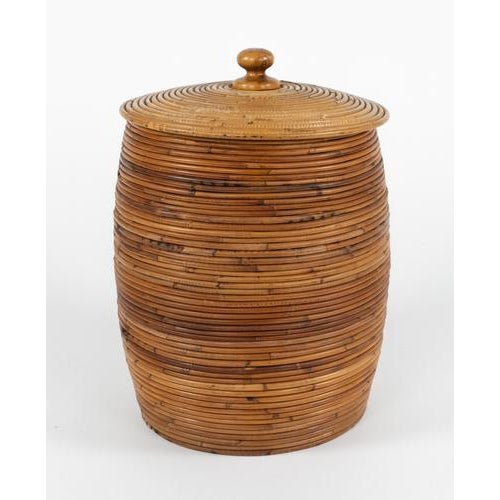 Midcentury wonderful round basket with lid in rattan and bamboo in the style of Vivai Del Sud. Made in Italy in the 1970s....