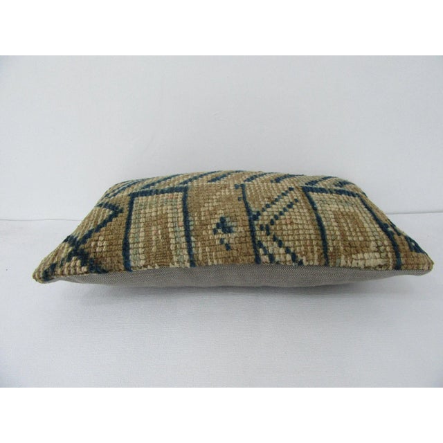 Decorative pillow cover made from a vintage Turkish handknotted rug. Backed with good quality cotton fabric. Pillow...