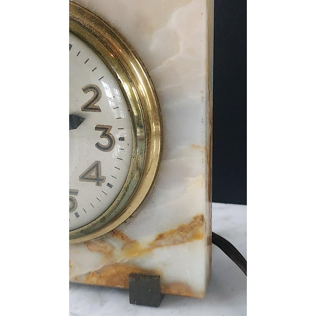 This sculptural Art Deco onyx desk clock was crafted in the 1930s–40s by the Sessions Clock Company and showcases the rich...