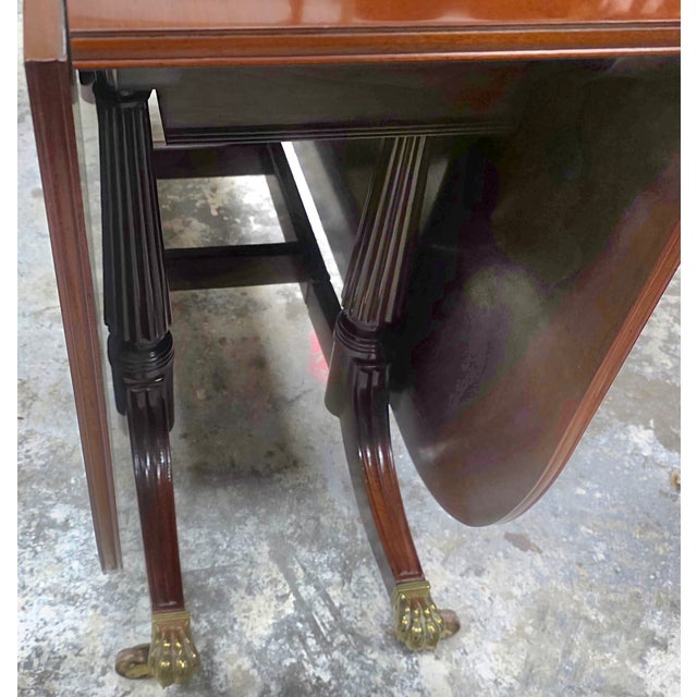 Late 20th Century Baker Furniture Williamsburg Reproduction Mahogany Drop-Leaf Dining Table For Sale - Image 10 of 13