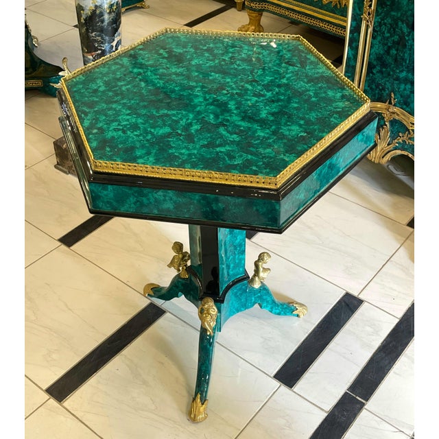 Make a statement with this distinctive French-inspired center table, featuring a striking geometric tabletop in a rich...