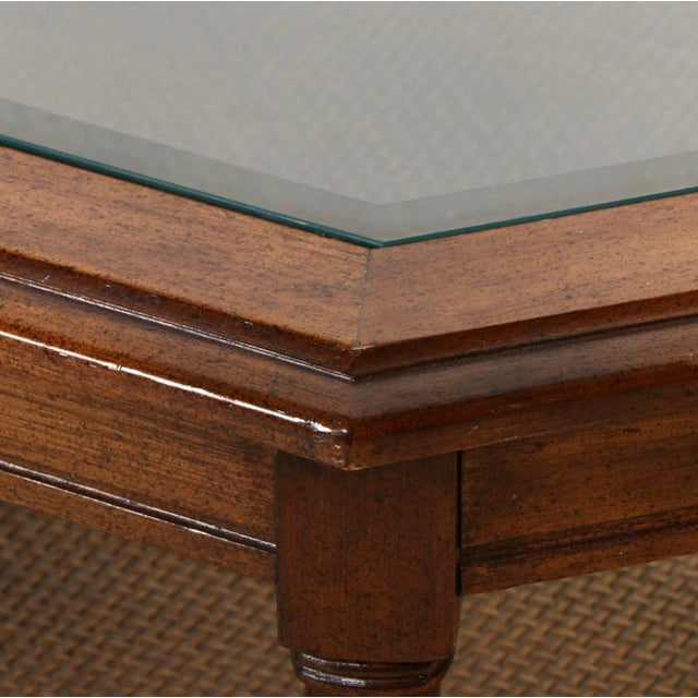 I love this petite wooden coffee table . It’s a great, unique shape; while also being timeless. Can blend with a wide...