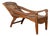 Antique Indonesian Reclining Plantation Chair with Bamboo Slats and Carved Décor For Sale