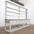 Large painted wooden grocery cabinet, early 20th century. Long, low counter with numerous drawers featuring wooden knobs....