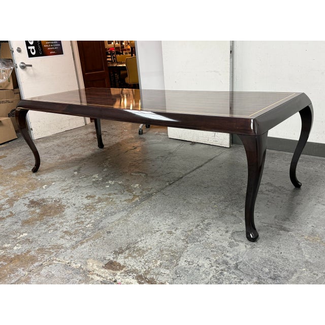 Design Plus Gallery presents a Macassar Dining Room Table that was Custom Made by Inner Gaze. The silhouette of the table...