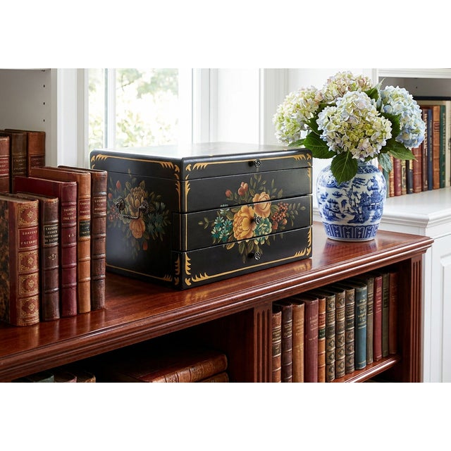 A striking marriage of traditional drama and specialized function, this grand-scale Chinoiserie silverware chest brings...