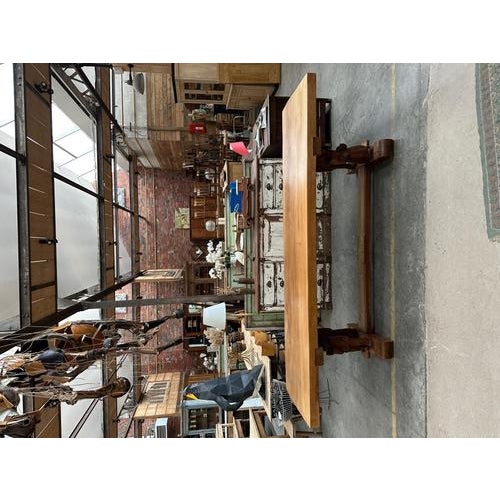 This table is in excellent condition. Its hand-carved legs are what make it so unique. Its very thick solid elm tabletop...