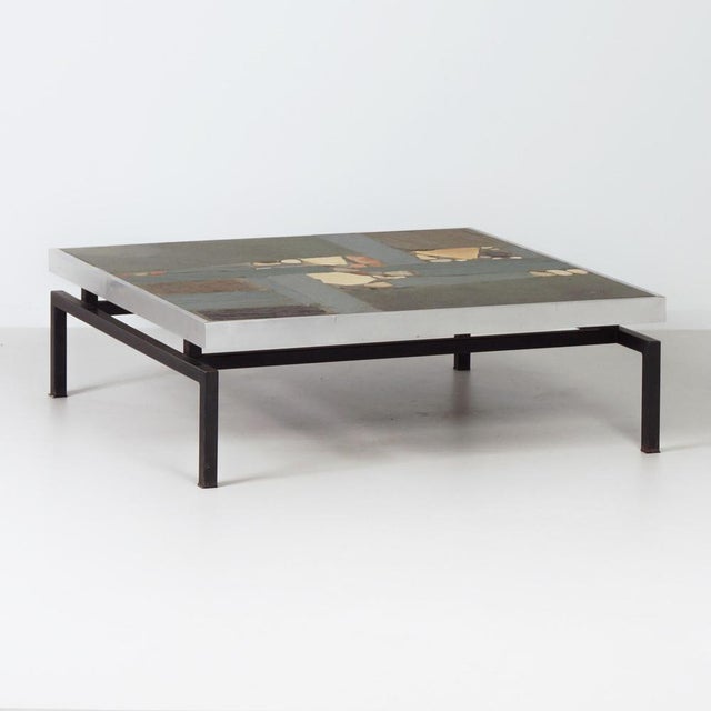 Paul kingma coffee table from 1969 with aluminium edge, pebbles and black metal base – an early square edition with his...