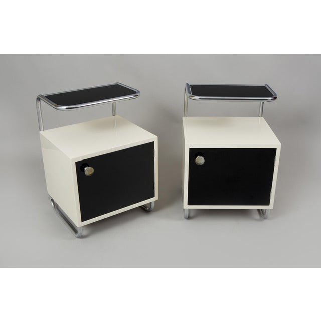 This pair of nightstands is an excellent representative of interwar functionalism in the Bauhaus style from the first half...