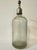 Vintage seltzer/siphon bottle. Thick & heavy glass with silver top. Glass straw inside is intact. Does not open. Measures...