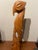 The following sculpture is made of oak, showcases exceptional craftsmanship. Its heavy, solid build indicates durability,...