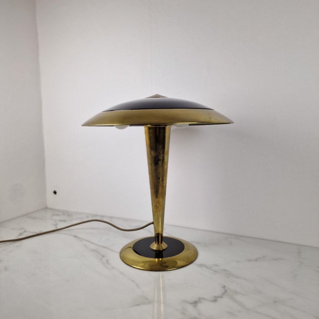 Elegant and rare table lamp designed by Oscar Torlasco for Ecoluce, Italy, circa 1970s. This refined piece is a strong...