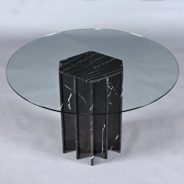 This listing is for the table alone. The chairs are not included and no longer available. Luxurious black marble pedestal...