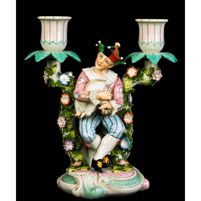 A wonderfully whimsical and highly decorative pair of antique german porcelain figural candelabra, dating to the late 19th...