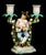 A wonderfully whimsical and highly decorative pair of antique german porcelain figural candelabra, dating to the late 19th...