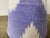 A clip top chandelier shade handmade from a hand woven ikat fabric. Measurements: top 3” side 4” bottom 4”
