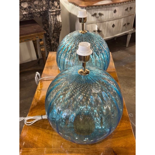 Pair of modern large scale Murano glass globe shape lamps. Globe-shaped lamps are a hallmark of Italian mid-century...