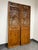 Design Plus Gallery presents a Pair of Vintage Chinese Carved Wood Divider Panels. This two-panel set has ornately carved...