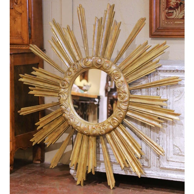 Bring dramatic sculptural presence to a wall with this impressive antique-style sunburst mirror. Crafted in Italy circa...
