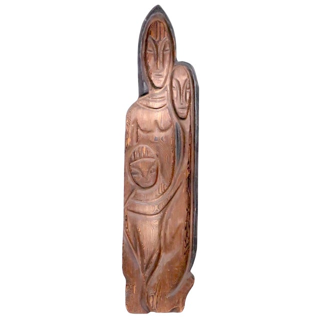 Large wood sculpture made by Witco, c.1960/70's, depicting a Mother Farther and Child, executed in the signature Witco...